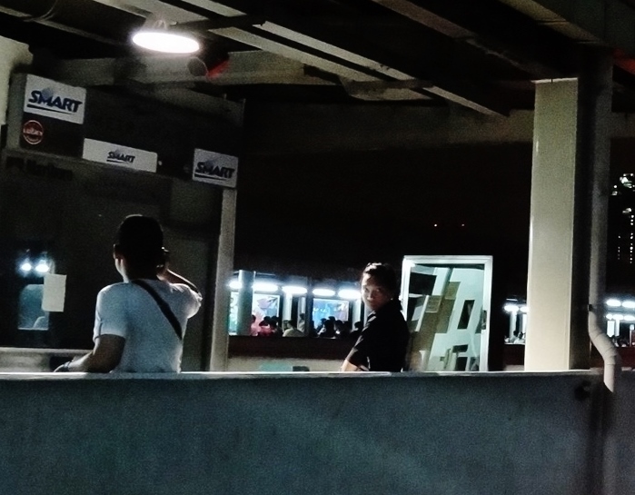 Manila girl staring night detail